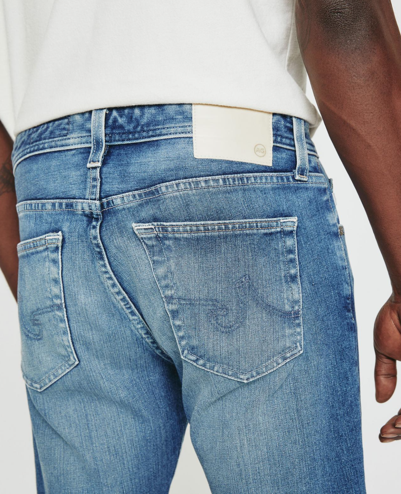 close up of rear ag jeans dylan slim fit jean in talavera blue, showing rear pocket detail