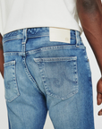 close up of rear ag jeans dylan slim fit jean in talavera blue, showing rear pocket detail