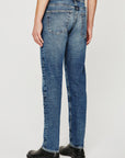 model wearing ag jeans tellis modern slim jean in warhol blue, shown from the waist down