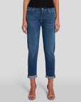 model wearing 7 for all mankind josefina boyfriend fit jean in broken twill vanity blue, shown from the waist down