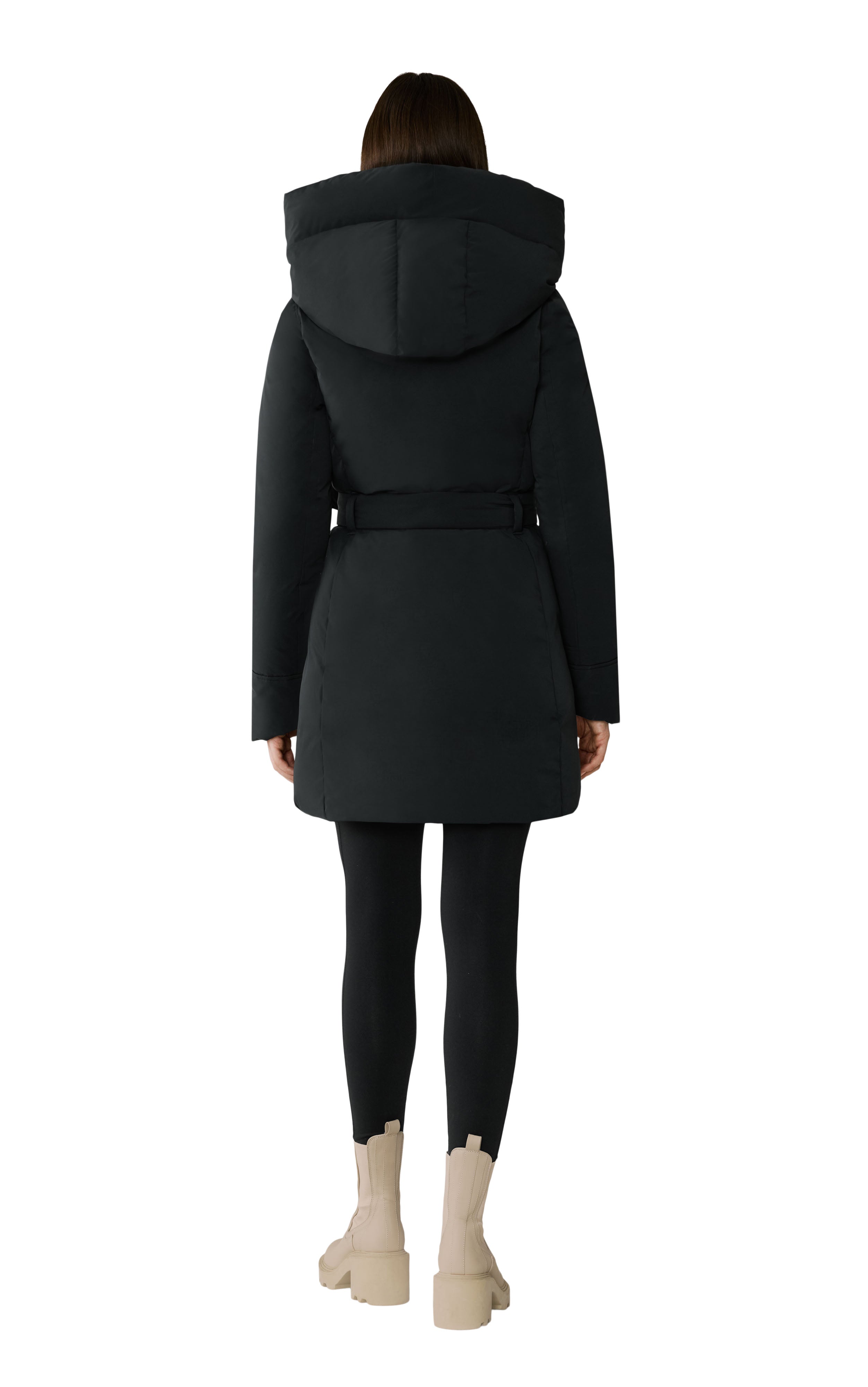 woman wearing a black coat with a hood on a white background