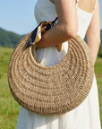 STRAW CRESCENT BAG WITH BOW