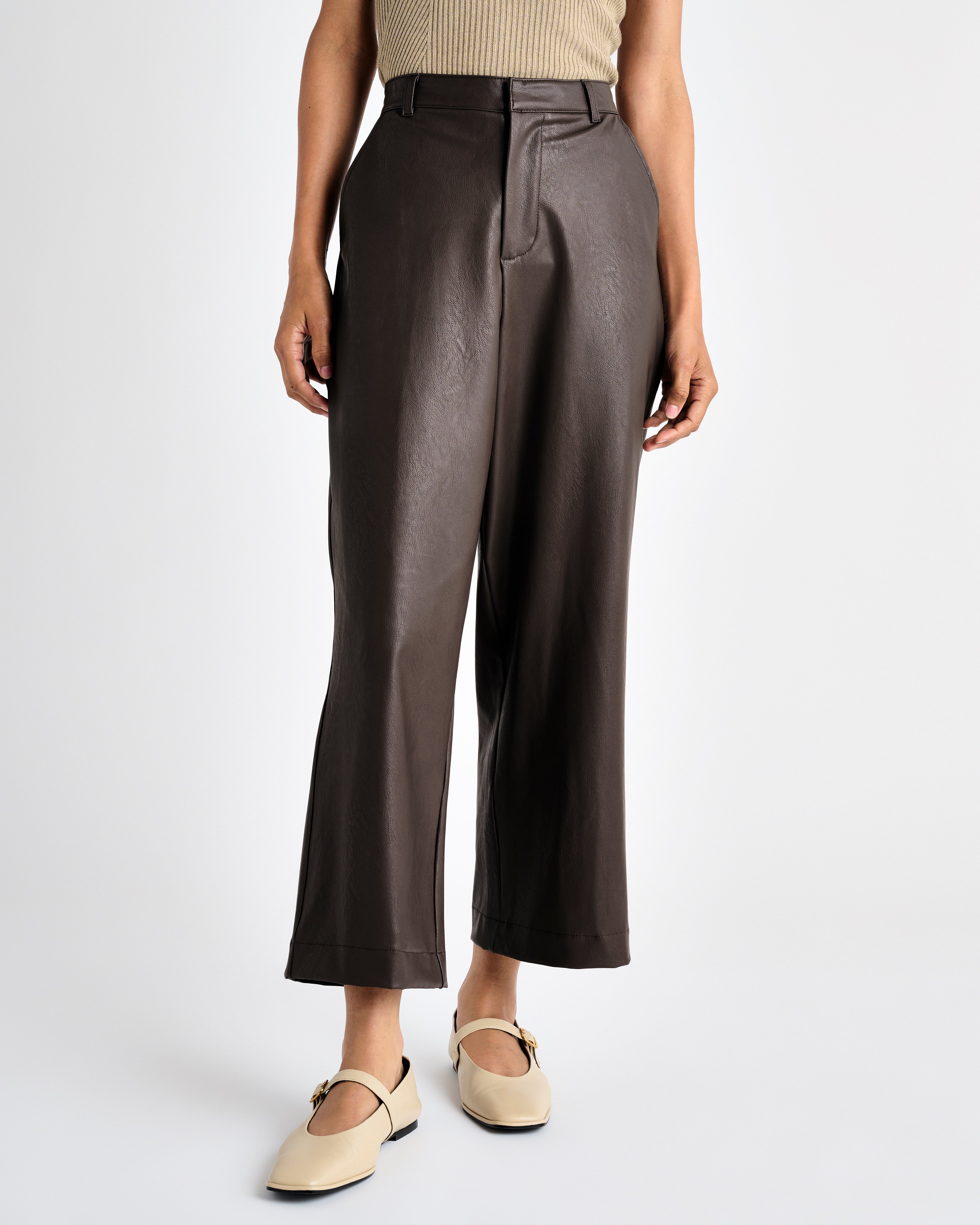 dark brown vegan leather ankle length wide leg trousers