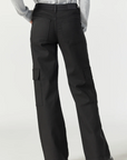 model wearing mavi jeans alva cargo pant in black luxe twill, from the back