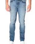model wearing fidelity denim torino slim fit jean in bataclan blue, shown from the waist down