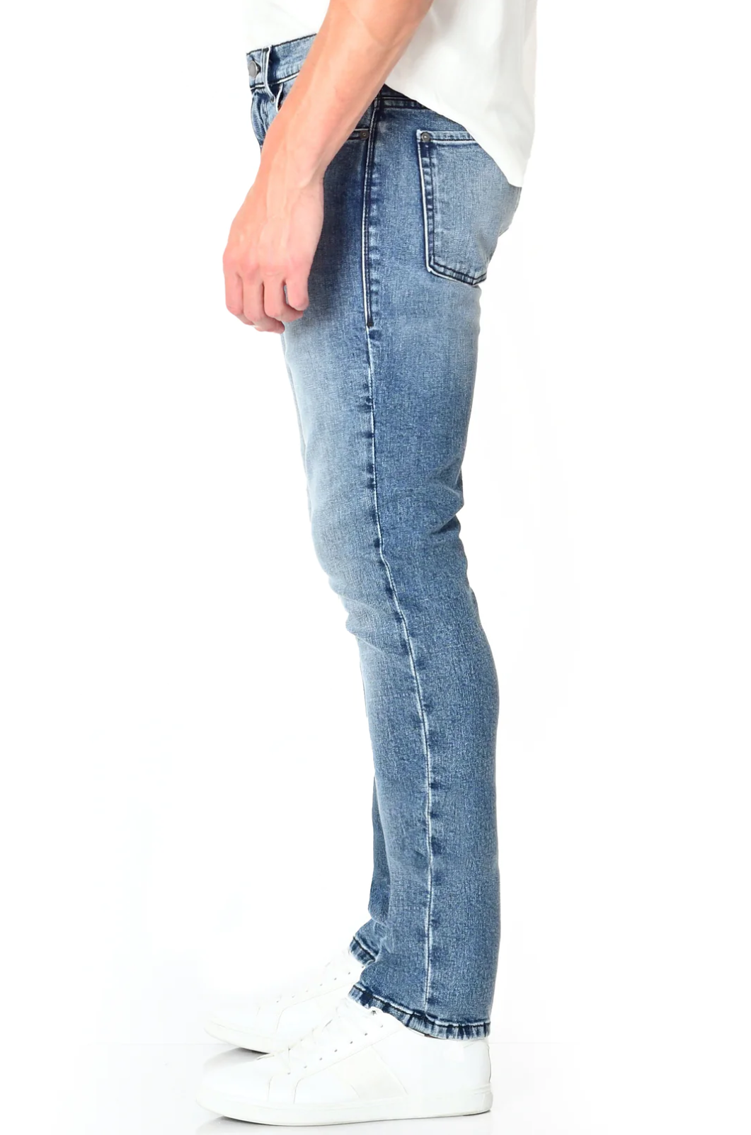 model wearing fidelity denim torino slim fit jean in bataclan blue, shown from the side