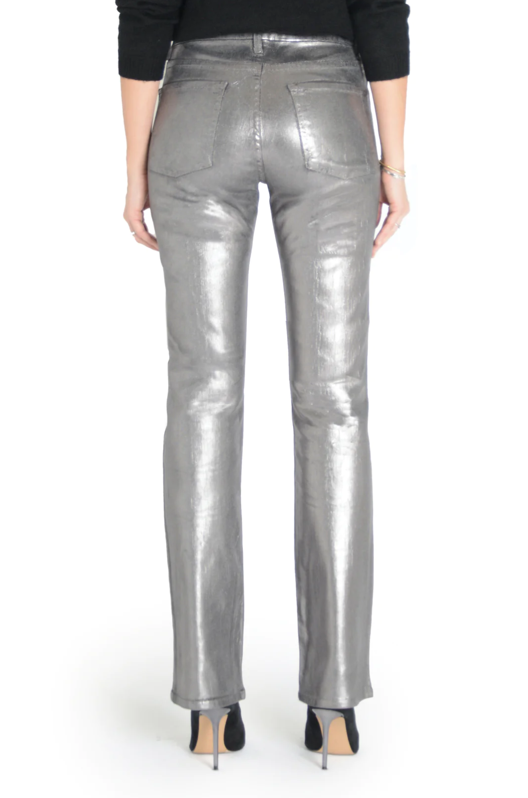 model wearing fidelity denim kora bootcut pant in silver gunmetal foil, shown from the rear