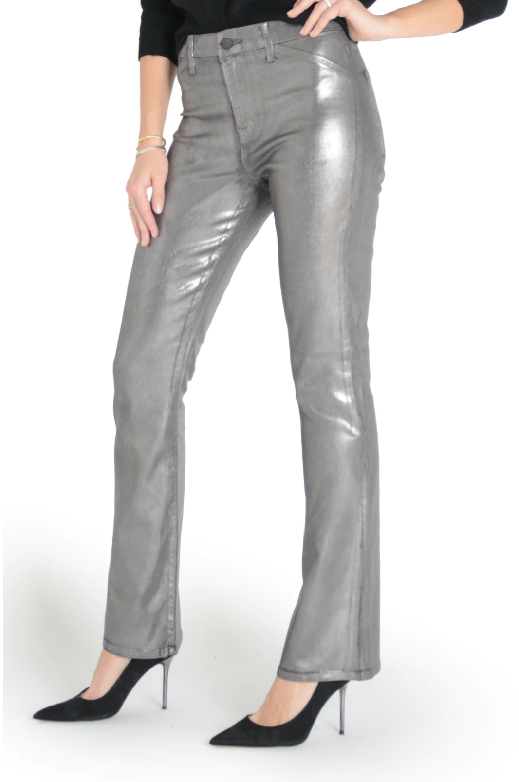model wearing fidelity denim kora bootcut pant in silver gunmetal foil, shown from the side