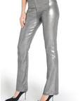 model wearing fidelity denim kora bootcut pant in silver gunmetal foil, shown from the side
