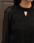 SHEER SLEEVE KNIT TOP WITH KEYHOLE