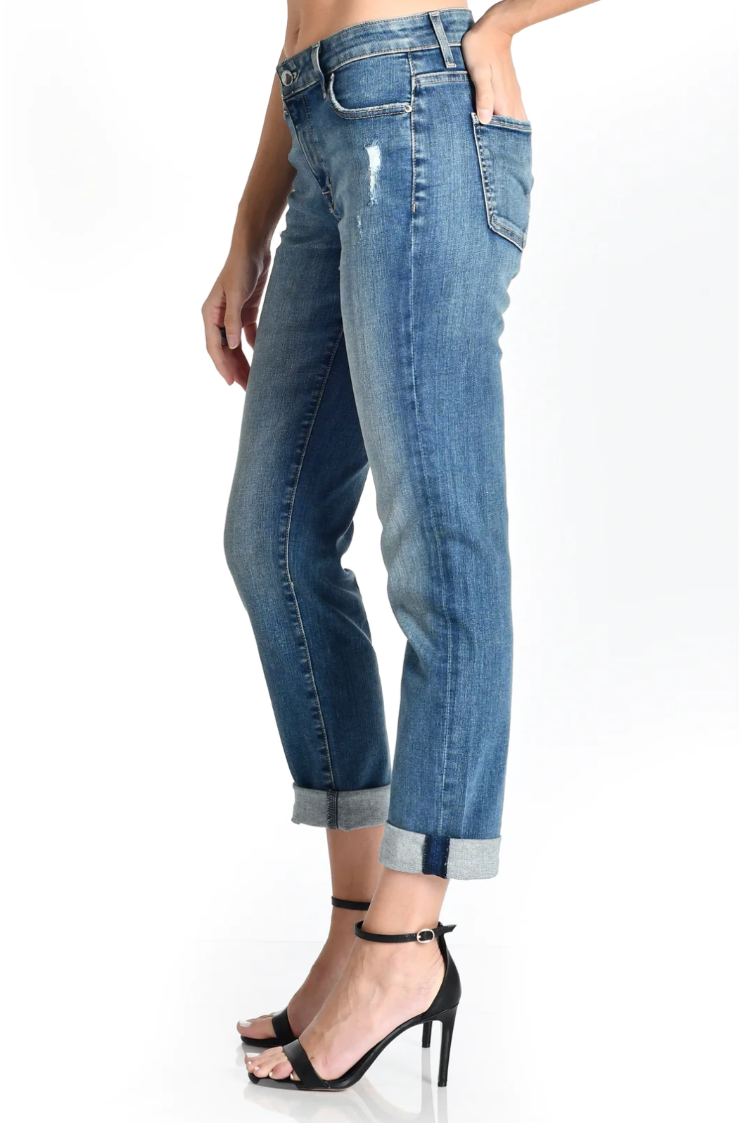 model wearing fidelity denim axl girlfriend fit jean in mao blue, shown from the side