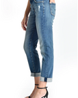 model wearing fidelity denim axl girlfriend fit jean in mao blue, shown from the side