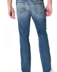 model wearing fidelity denim jimmy slim straight jean in el ray blue, shown from the rear