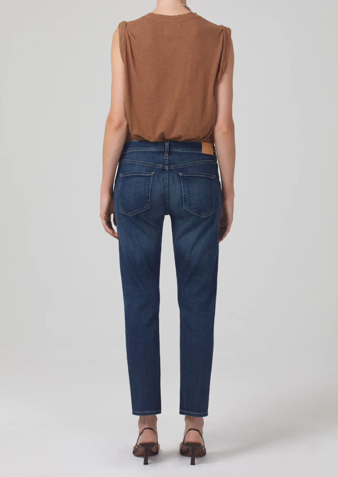 model wearing citizens of humanity emerson slim fit boyfriend jean in blue rose, rear