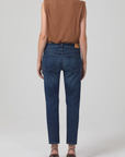 model wearing citizens of humanity emerson slim fit boyfriend jean in blue rose, rear