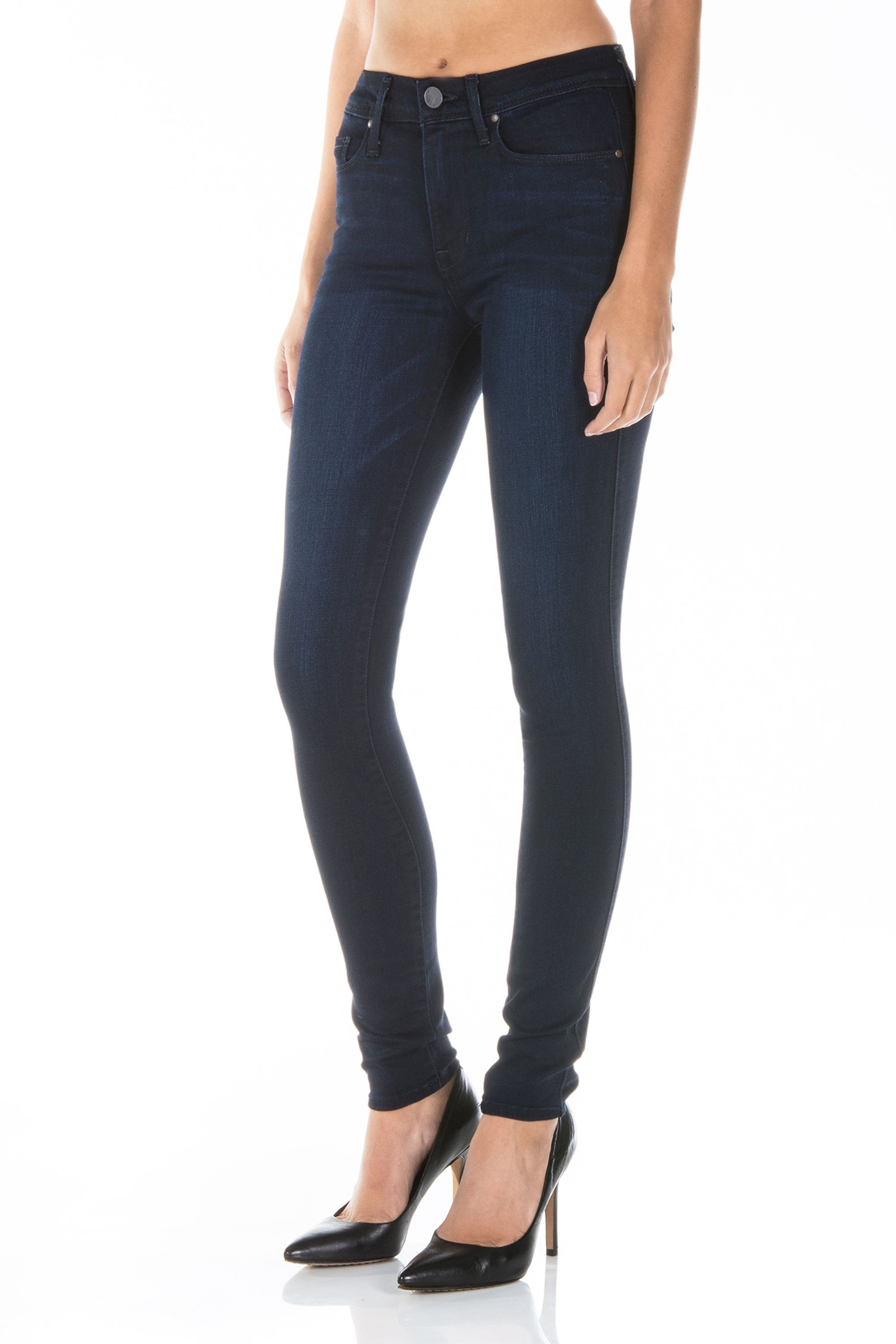 model wearing fidelity denim gwen high rise skinny jean in falcon blue, shown from the side