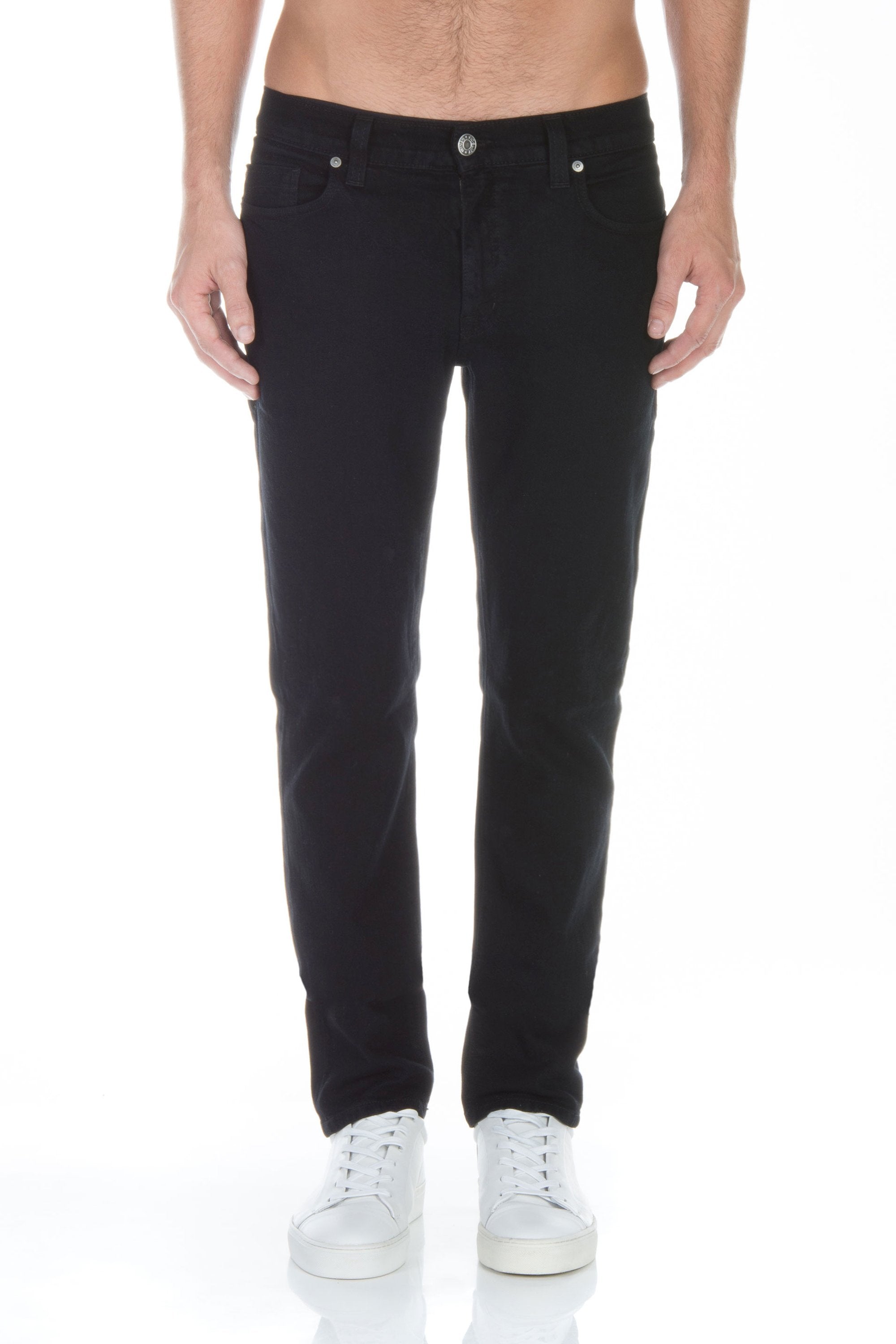 model wearing fidelity denim torino slim fit jean in gotham black, shown from the waist down