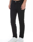 model wearing fidelity denim torino slim fit jean in gotham black, shown from the side