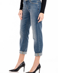 model wearing fidelity denim axl girlfriend fit in lagoon blue, side