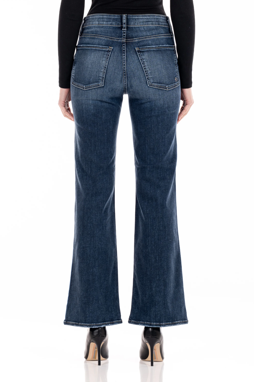 model wearing fidelity denim katie trouser fit in st tropez blue, shown from the rear