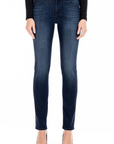 model wearing fidelity denim stevie mid rise slim jean in richmond blue, shown from the waist down