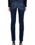 model wearing fidelity denim stevie mid rise slim jean in richmond blue, shown from the rear
