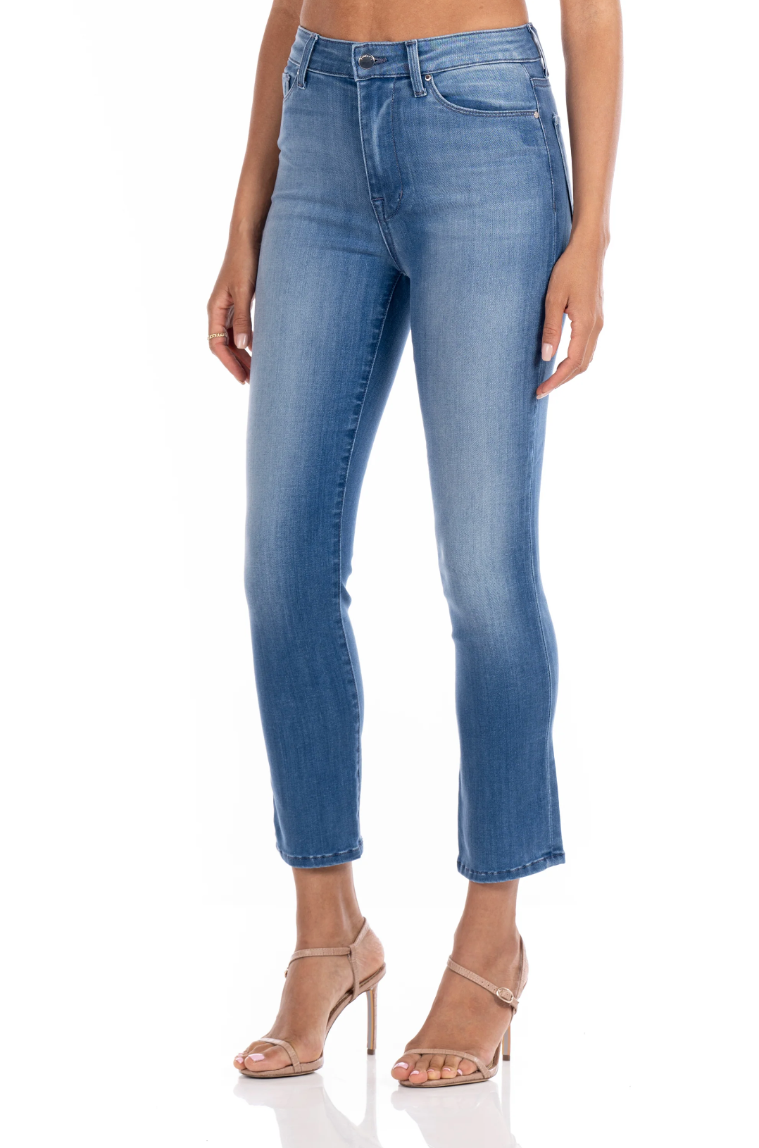 model wearing fidelity denim cher slim jean in st martin blue, shown from the side