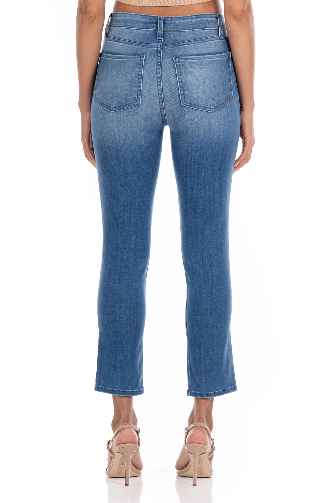 model wearing fidelity denim cher slim jean in st martin blue, shown from the rear