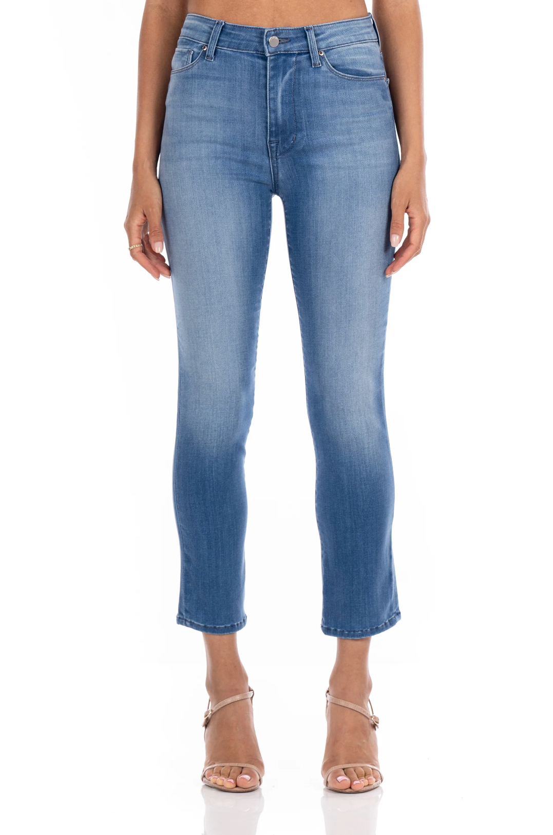 model wearing fidelity denim cher slim jean in st martin blue, shown from the waist down