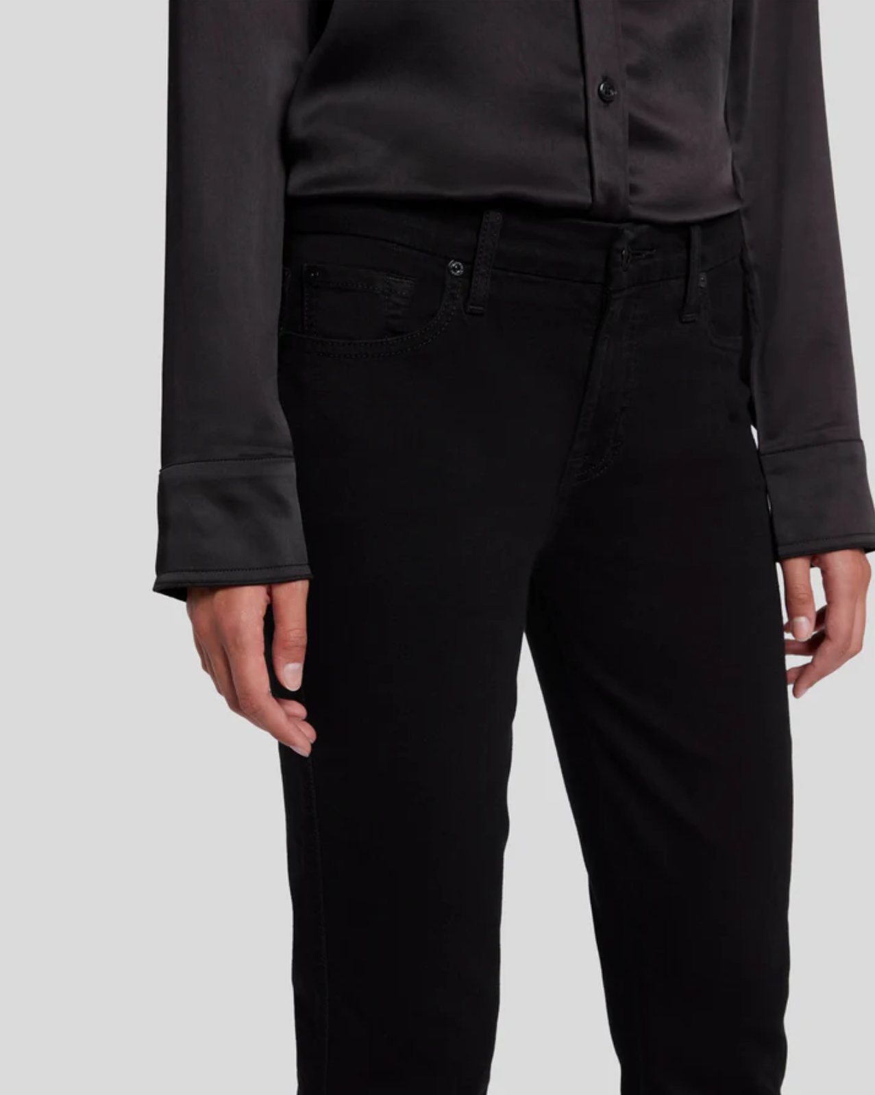 up close front view of the waist of the 7 for all mankind kimmie mid rise straight in rinse black, showing front pocket detail