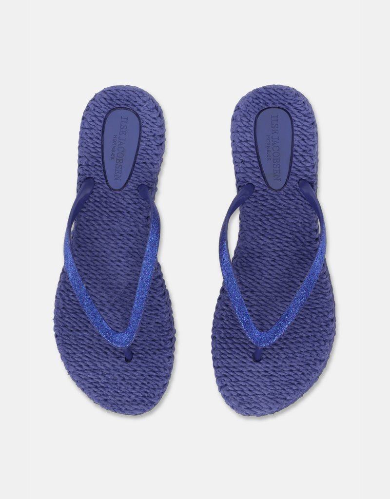 pair of ilse jacobsen flip flops in glitter blue, shown from above