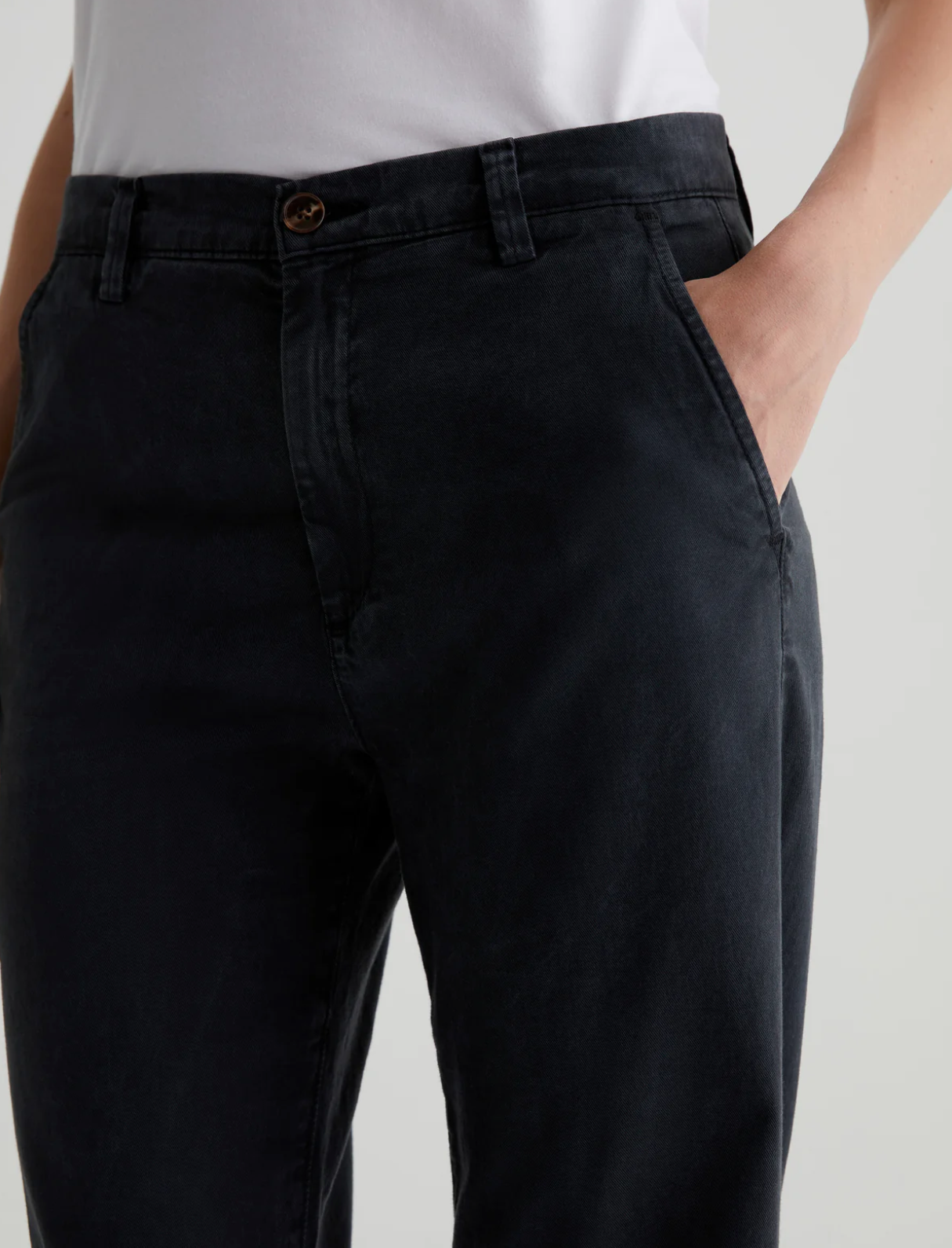 up close view of the waistline with model's hand in the pocket