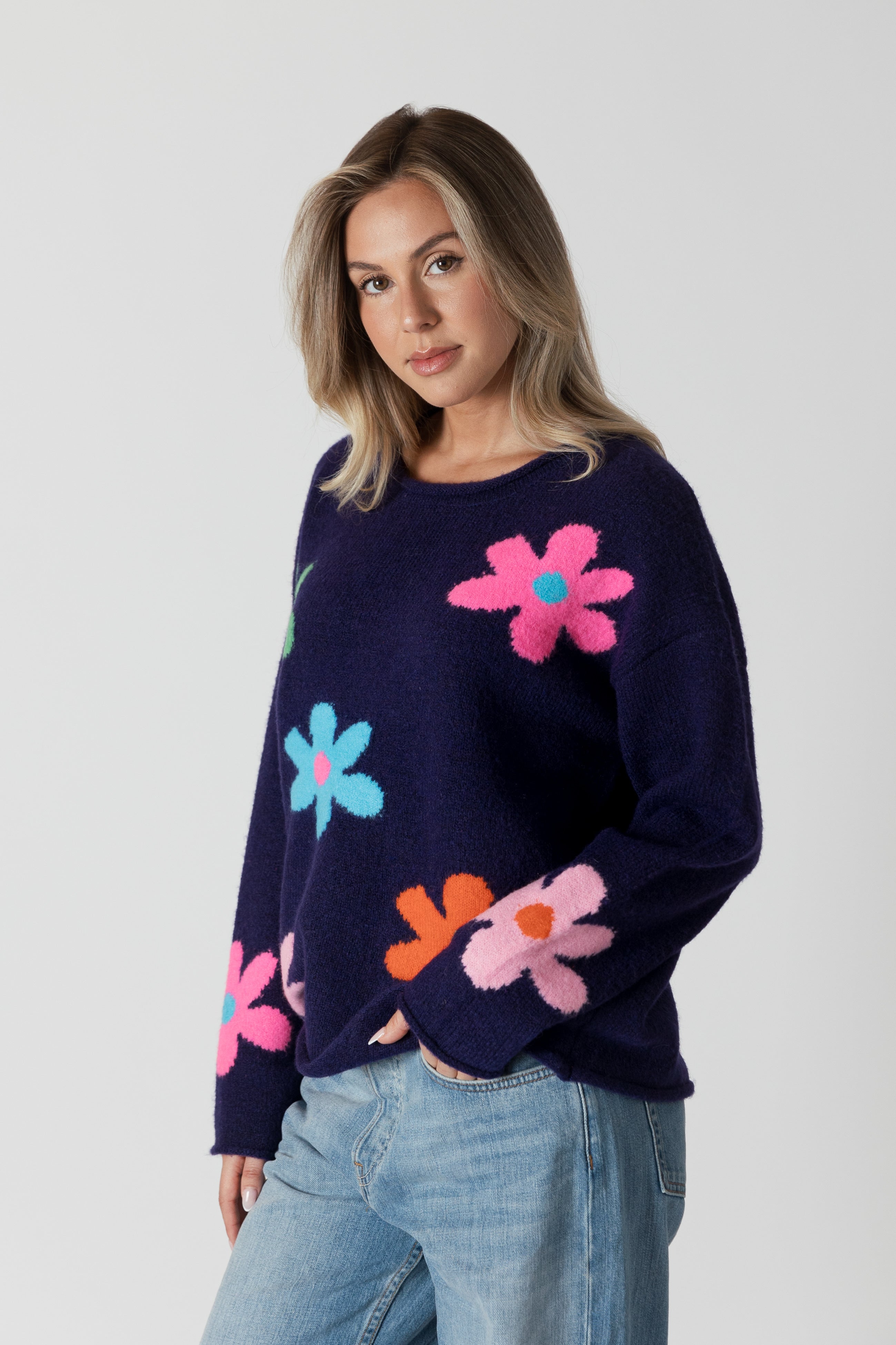 model wearing lyla &amp; luxe jodi multicolour flower print sweater, angled view