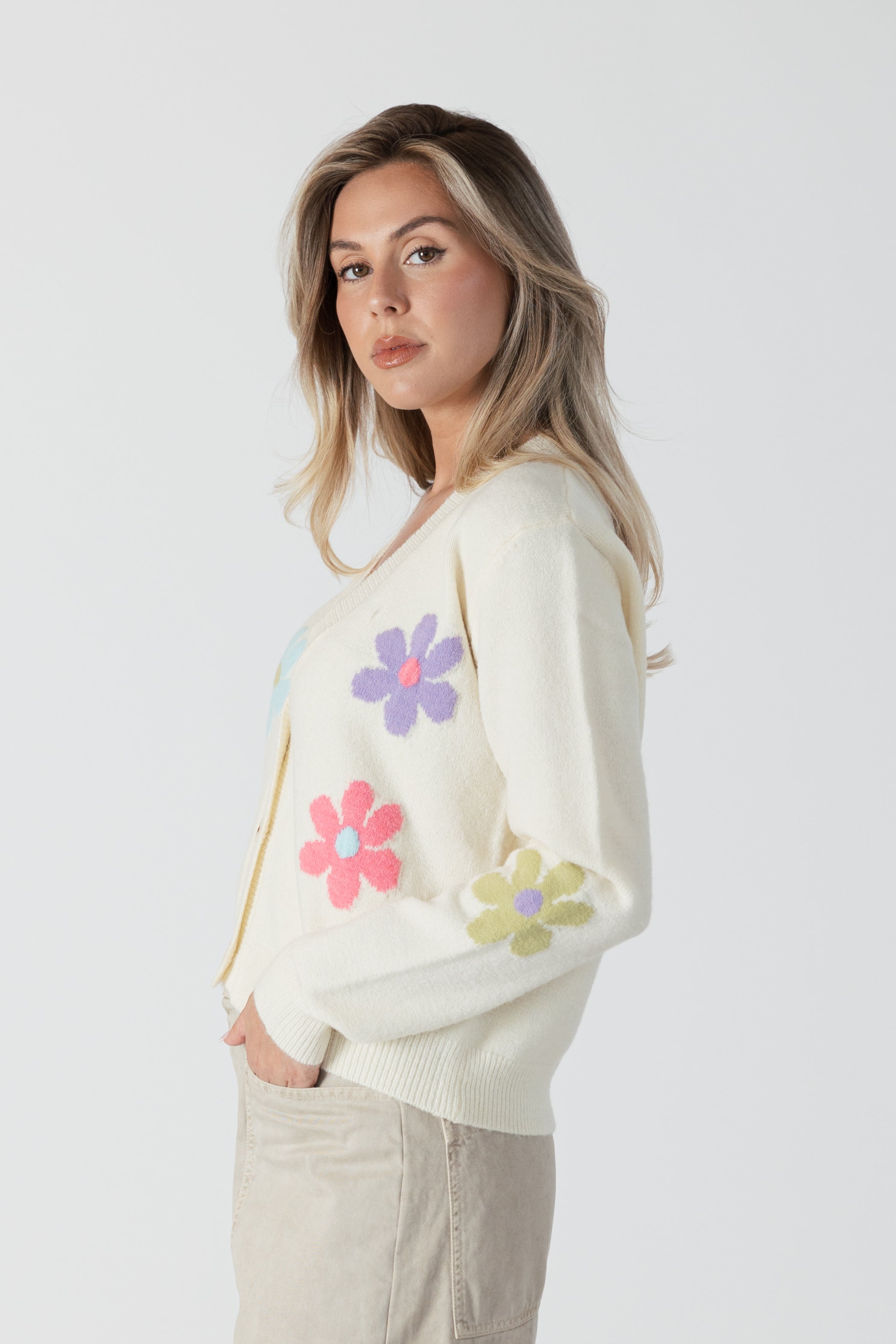 model wearing jolene button front floral print cardi from lyla &amp; luxe, side view 