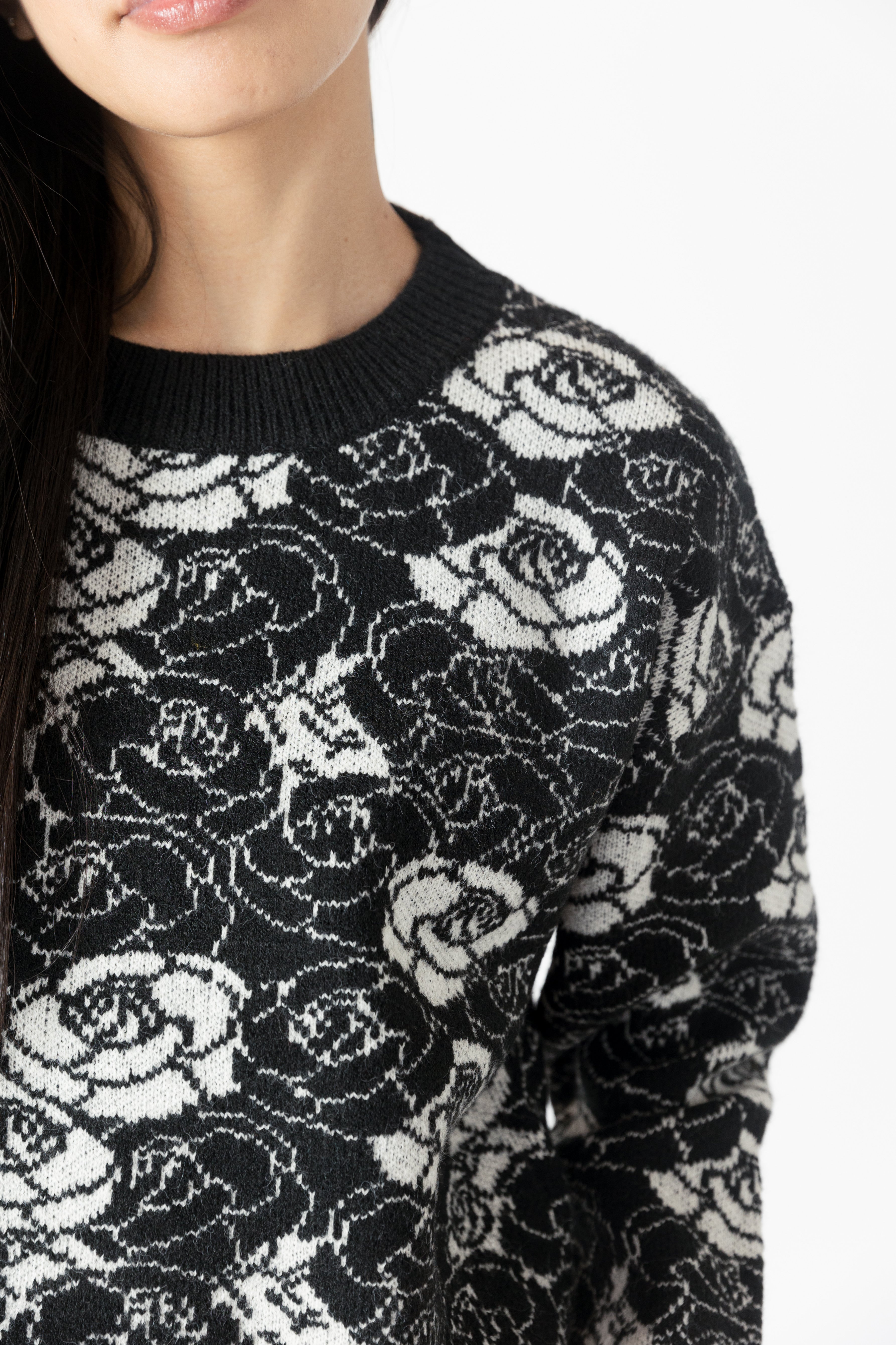 model wearing jordyn rose print crew neck sweater from lyla &amp; luxe, detail view