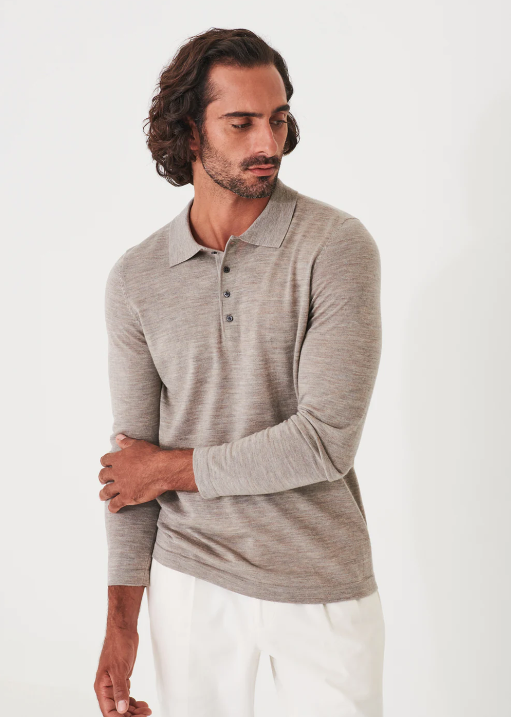 front view of the 14GG MERINO POLO, styled with white pants
