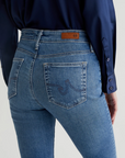 close up of the rear of ag jeans farrah boot cut jean in montecito blue, showing back pocket detail