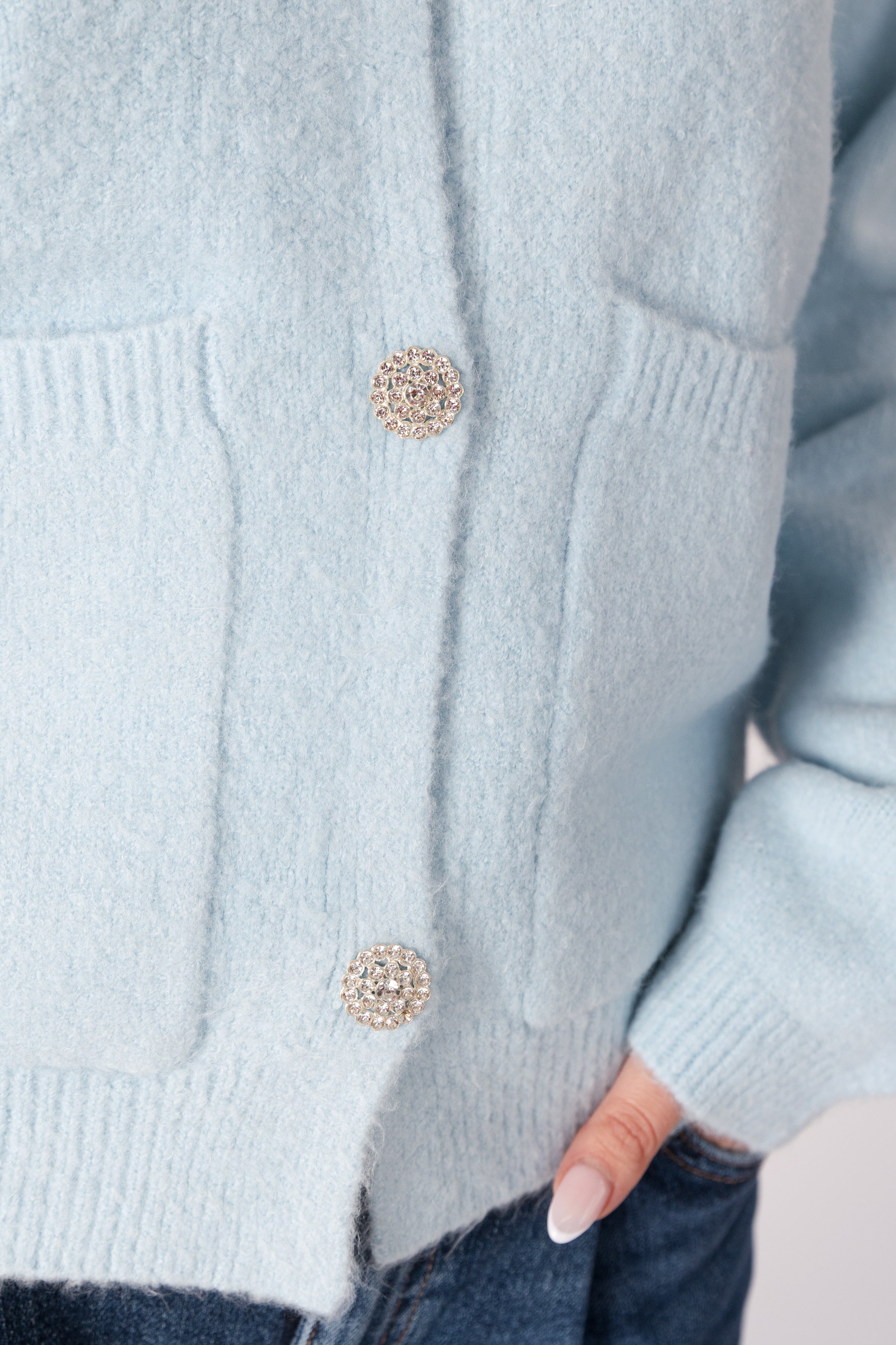 close up of buttons on lyla &amp; luxe stella crystal button cardigan