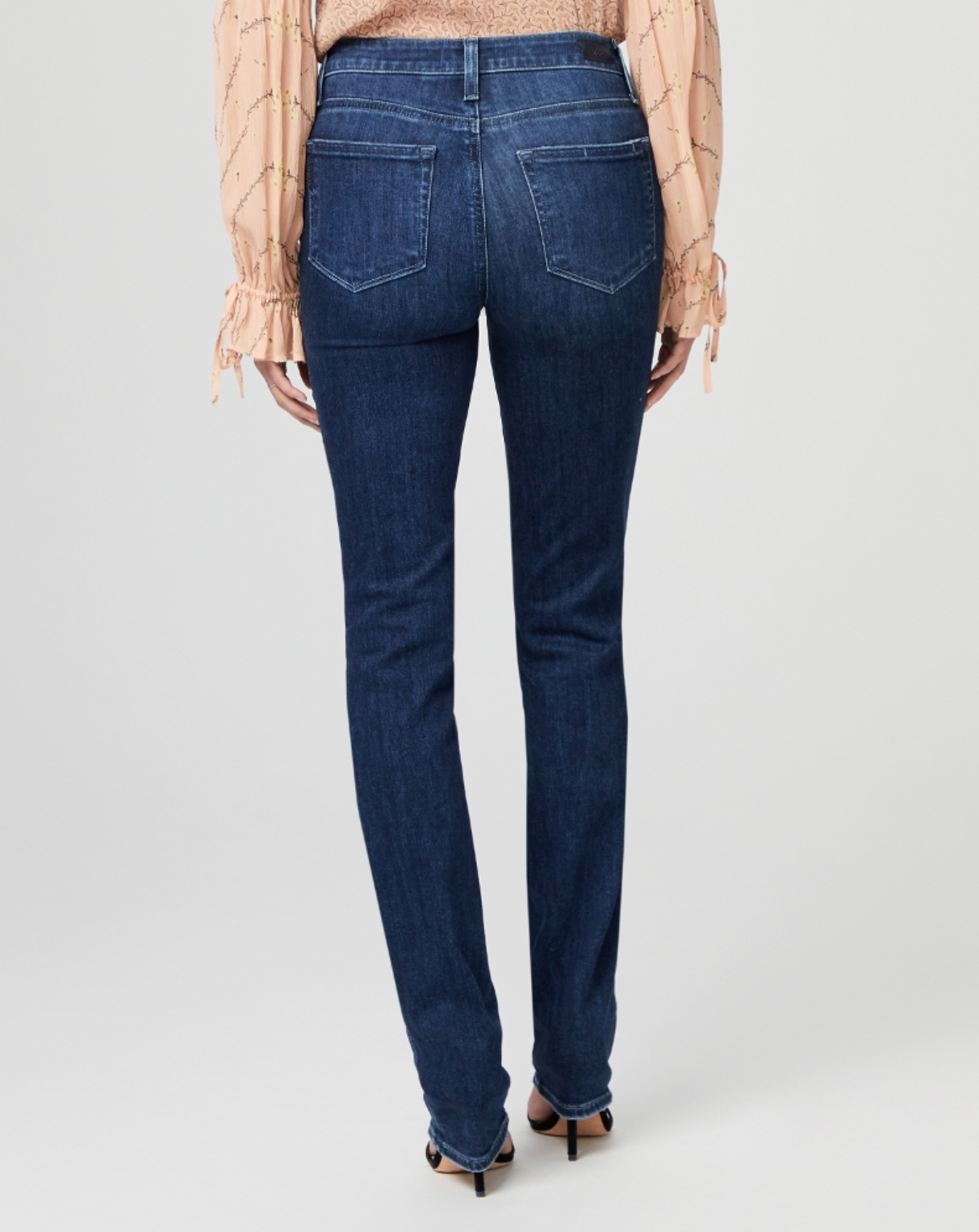 waist down rear view of the hoxton high rise straight jean from Paige, in monarch blue 