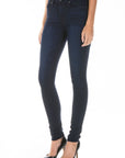 model wearing fidelity denim gwen high rise skinny jean in falcon blue, shown from the side