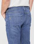close up rear view of the federal slim straight jean from paige in redding blue, showing pocket detail 