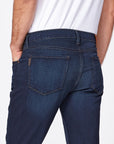 close up rear view of the federal slim straight jean from paige in russ blue, showing rear pocket detail