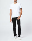 full body view of the lennox skinny fit jean from Paige in black shadow, styled with a white t-shirt